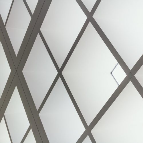 low-angle-shot-ceiling-building-made-bright-lighted-squares